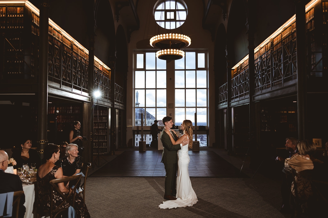 The Library grand hall, the full length of the room under the chandeliers at dusk