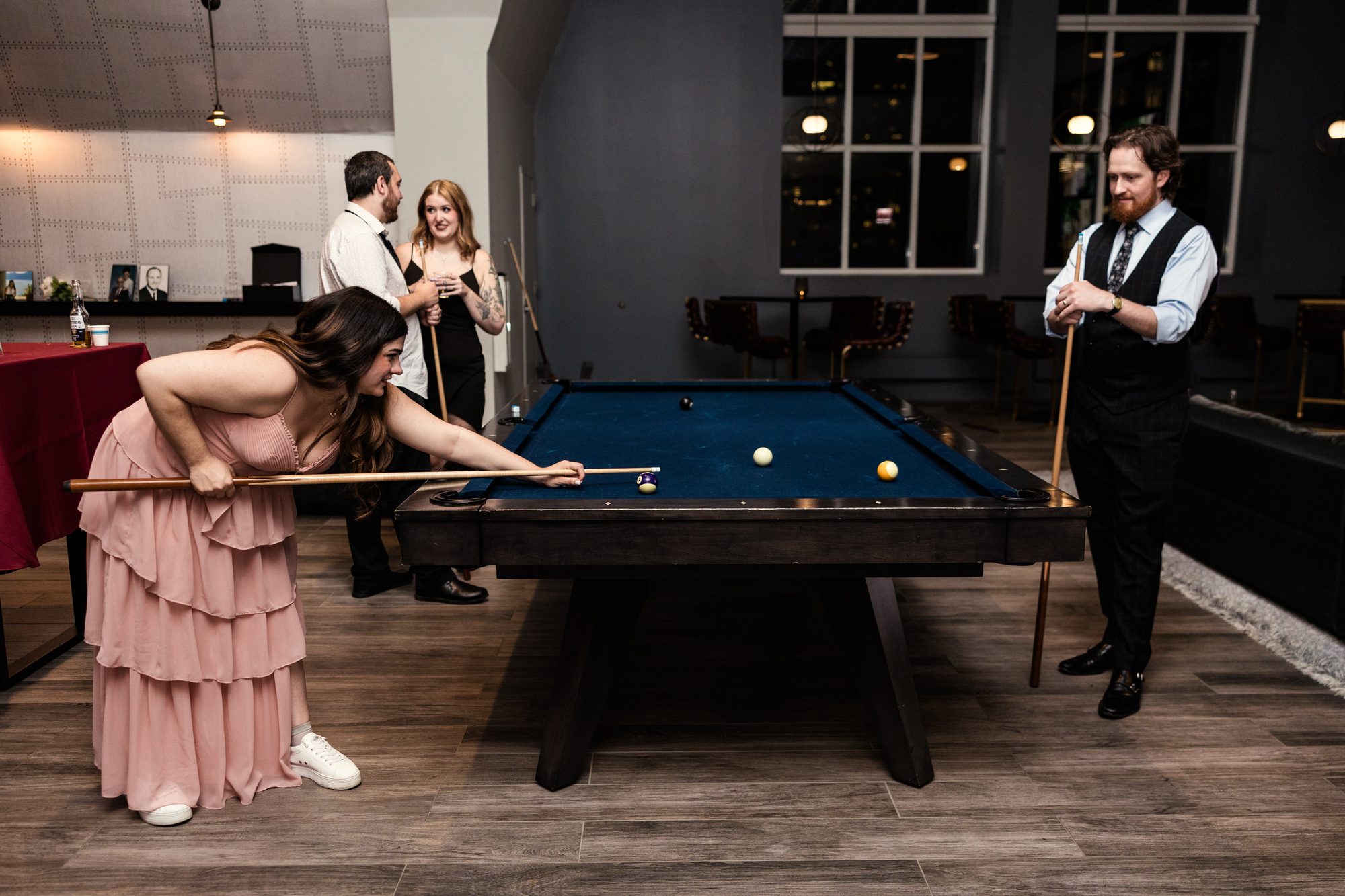 Guests playing pool in The Stacks