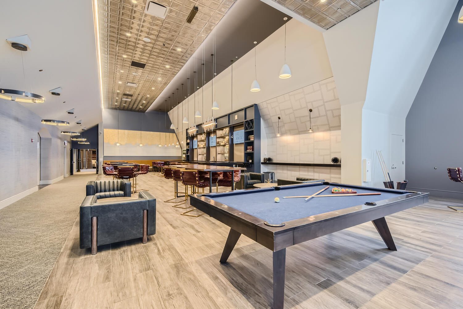 The pool table and lounge seating in The Stacks